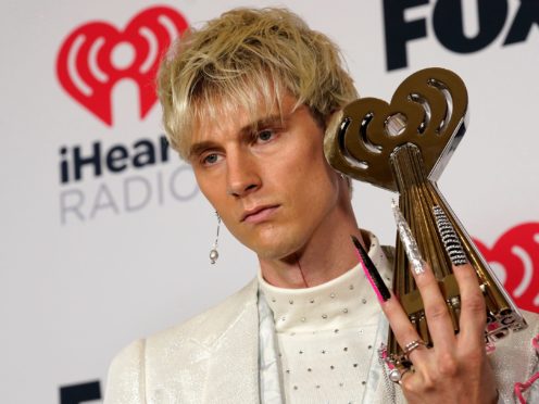 Machine Gun Kelly was among the winners at the iHeartRadio Music Awards (AP Photo/Chris Pizzello)