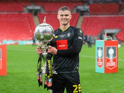 Josh McPake lifts the FA Trophy at Wembley (Matt Kirkham, TownPix/PA handout)