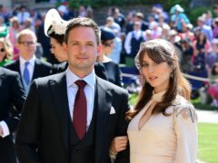 Patrick J Adams and wife Troian Bellisario at the wedding of Meghan and Harry (Ian West/PA)