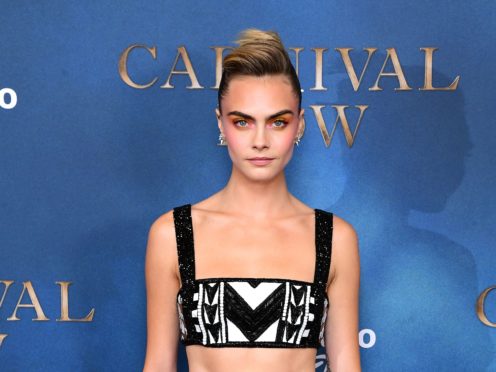 Model Cara Delevingne has said how she sexually identifies constantly changes, describing it as being like a ‘pendulum swinging’ (Ian West/PA)