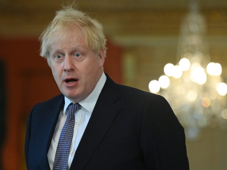 Downing Street has said that Boris Johnson has no plans to give MPs a vote on cuts to overseas aid (Justin Tallis/PA)