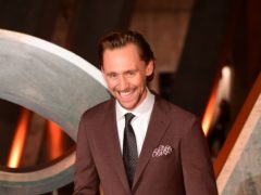 Tom Hiddleston posed on the red carpet at an event to mark the launch of his Disney+ series Loki (Ian West/PA)