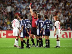 England’s David Beckham is given the red card by Danish referee Kim Milton Nielsen, after a foul on Argentina’s Diego Simeone during the 1998 World Cup (Adam Butler/PA)