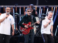 Ian Broudie (centre) of the Lightning Seeds performs with David Baddiel (left) and Frank Skinner (David Davies/PA)