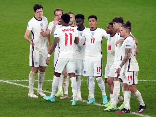 The England team during Sunday’s penalty shootout defeat (Mike Egerton/PA)