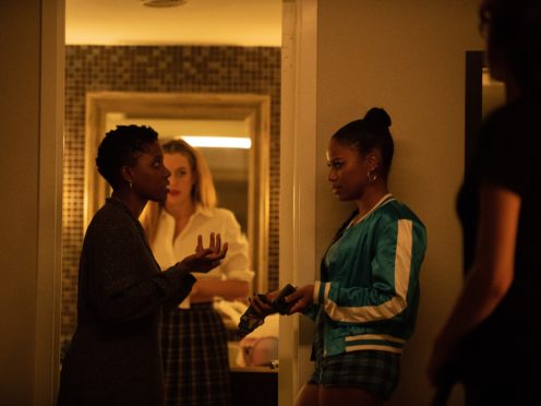 Director Janicza Bravo, actor Riley Keough and actor Taylour Paige on the set of Zola (Anna Kooris/A24 Films)