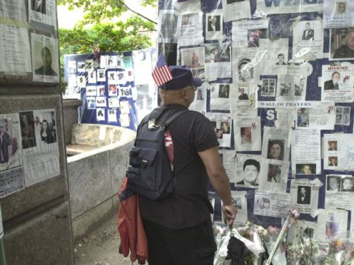 Photos and posters of those missing from the World Trade Centre (Tim Ockenden/PA)