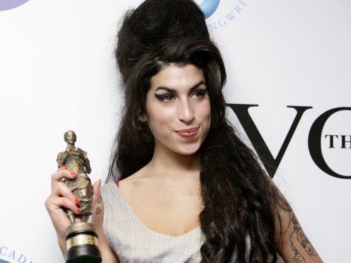The dress Amy Winehouse wore for her final performance is among a collection of the late singer’s personal items going under the hammer (Yui Mok/PA)