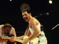 Freddie Mercury on stage (PA)