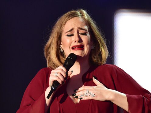 Adele collects the Global Success Award on stage during the 2016 Brit Awards at the O2 Arena, London. PRESS ASSOCIATION Photo. Picture date: Wednesday February 24, 2016. Photo credit should read: Dominic Lipinski/PA Wire