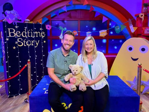 Chris and Rosie Ramsey on the CBeebies Bedtime Stories set (CBeebies Bedtime Stories/BBC/PA)