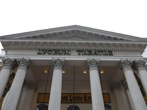 The Lyceum Theatre showing posters from the production the Lion King (PA)