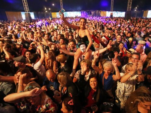 Music fans listening to the RTE concert Orchestra during the Electric Picnic festival (Niall Carson/PA)