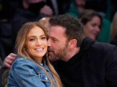 Jennifer Lopez and Ben Affleck attend an NBA basketball game between the Los Angeles Lakers and the Boston Celtics in LA (AP Photo/Marcio Jose Sanchez)