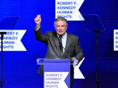 Alec Baldwin performs emcee duties at the Robert F. Kennedy Human Rights Ripple of Hope Award Gala at New York Hilton Midtown on Thursday, Dec. 9, 2021, in New York. (Photo by Evan Agostini/Invision/AP)