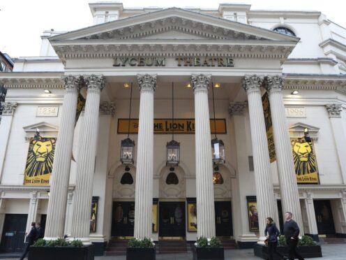 The Lyceum Theatre showing posters from the production the Lion King (PA)