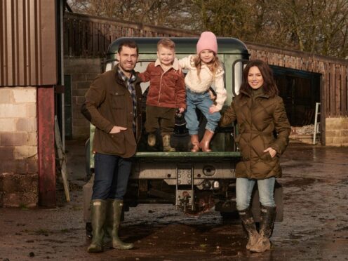 Kelvin and Liz Fletcher with their children (Handout/PA)