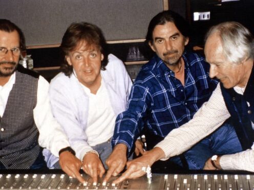 Ringo Starr, Paul McCartney, George Harrison with producer George Martin (PA)