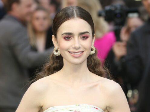 Lily Collins says Sandra Bullock and Julia Roberts acted as ‘mentors’ to her (Isabel Infantes/PA)