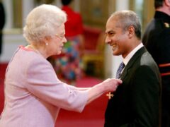 George Alagiah, journalist and television presenter is made an OBE by The Queen at Buckingham Palace (Martin Keene/PA).