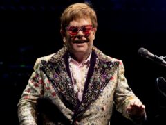 Elton John performs during his Farewell Yellow Brick Road tour in New Orleans (AP Photo/Derick Hingle/PA)