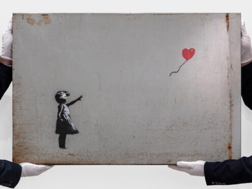 Banksy’s Girl With Balloon has a price estimate of £2 million to £3 million (Joshua White/Sotheby’s/PA)