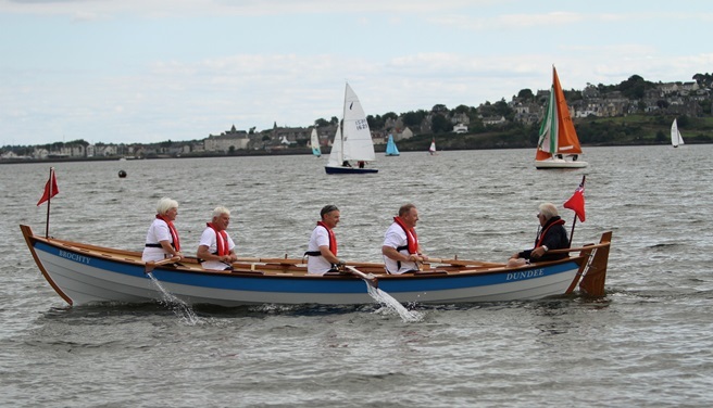 The Brochty on her maiden voyage, crewed by Mary Thomas, Sandy Bremner, Neil Ferguson, Gus Broahurst and John Knowles. Photo by Dougie Nicolson