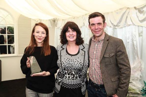 Sonnda (left) is presented with her award by Melanie Andrews and Johnathon Boyne