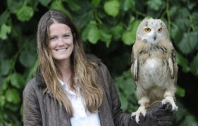 Rosie Drumm with a Siberian Eagle Owl chick at The Scottish Game Show