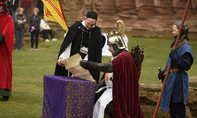 King Robert Bruce studies The Declaration of Arbroath