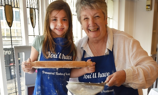 Darcey Burnham (7) from Troon with Shirley at the launch of Treasured Tastes of Scotland.