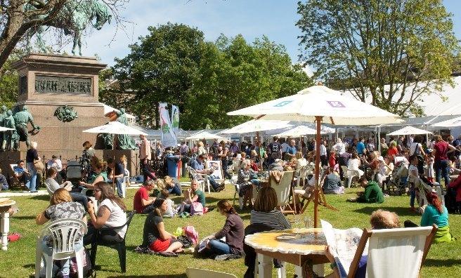 Relaxing in the sunshine at the Edinburgh International Book Festival. Photo courtesy of Edinburgh International Book Festival