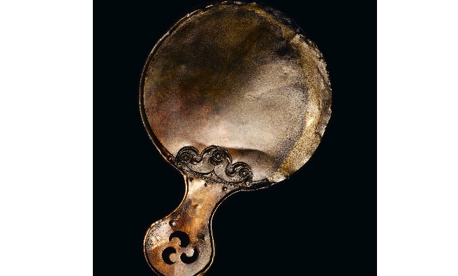 The Balmaclellan Mirror, one of the Iron Age mirrors which will tour the UK as part of the national programme of activity around Celts: art and identity. Photo copyright National Museums Scotland