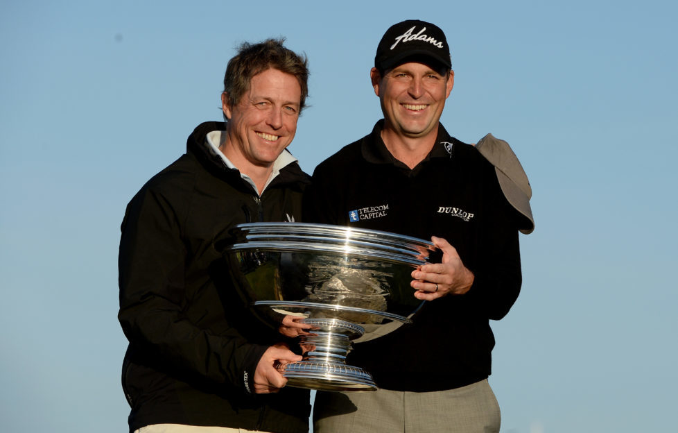 2013 winner of the Dunhill David Howell with partner Hugh Grant. Photo by Getty Images