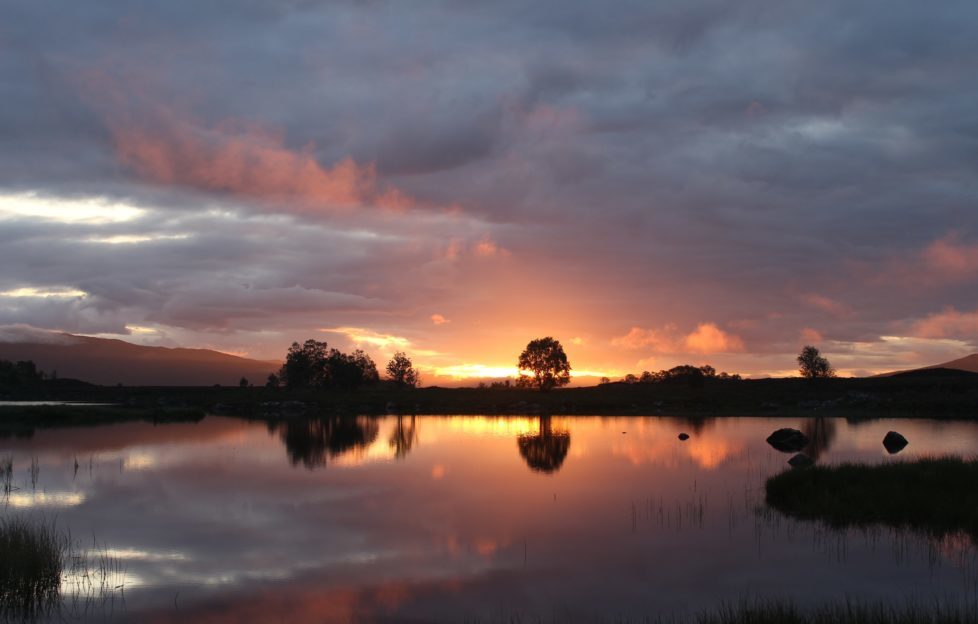 The sunrise over Loch Bà near Glen Coe