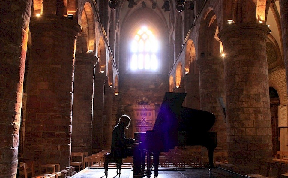 Jazz Pianist, Leszek Mozdzer, during a rehearsal at St Magnus Cathedral