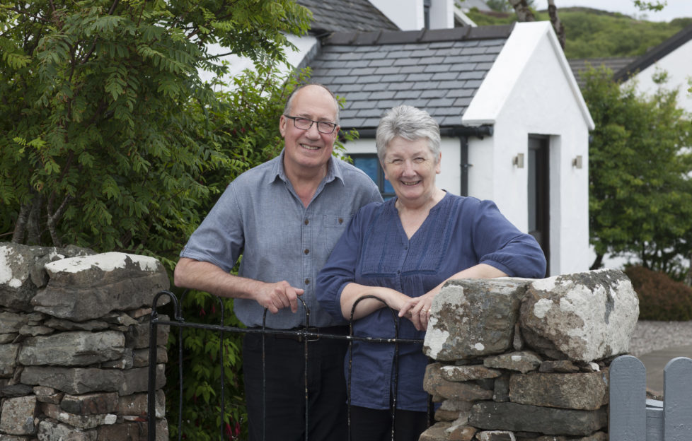 Shirley and Eddie standing proudly outside their famous restaurant. Pic: Angus Bremnar