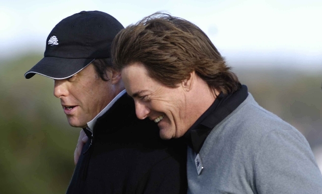 Hugh Grant and Kyle MacLachlan sharing a joke at a previous Dunhill. Photo by Sandy Young