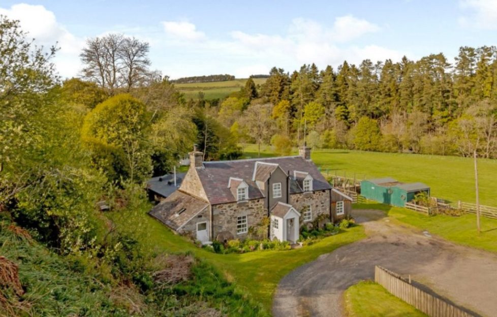 Modernised traditional cottage near a river Scottish Field