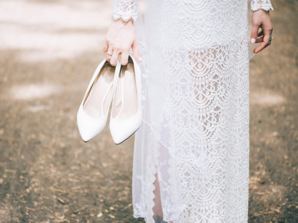 bride-holding-shoes Featured Image for Behind the scenes with Scotland's wedding filmmakers: Brian Scott Weddings