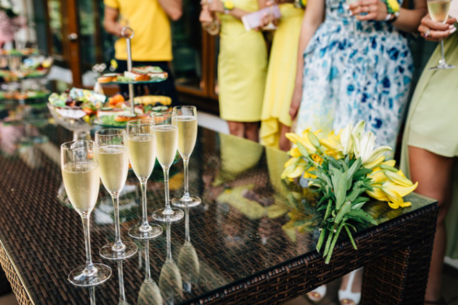 champagne glasses on the background of bright girls Featured Image for Scottish wedding events round-up: May 2019