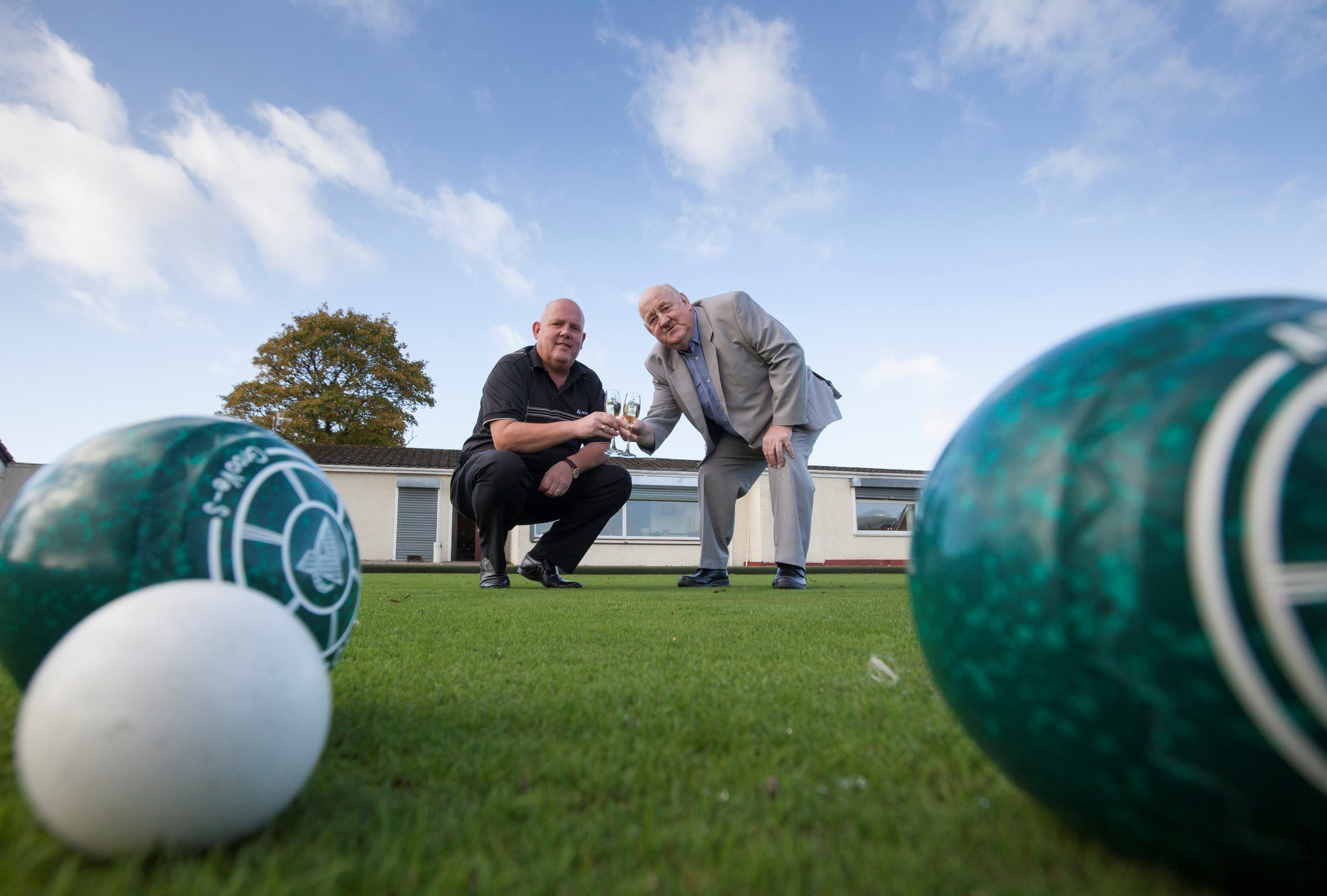 James Roy, right, from Shotts, North Lanarkshire, celebrating winning £1 million on the National Lottery with bowling legend Alex Marshall.