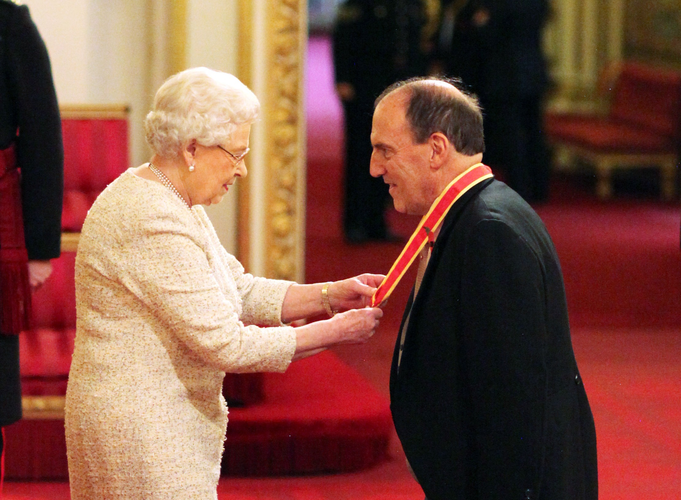 Sir Simon Hughes from London is made a Knight Bachelor of the British Empire from Queen Elizabeth II at an Investiture Ceremony at Buckingham Palace