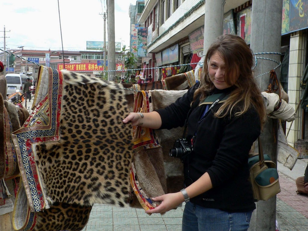 Environmental campaigner Debbie Banks with a leopard skin