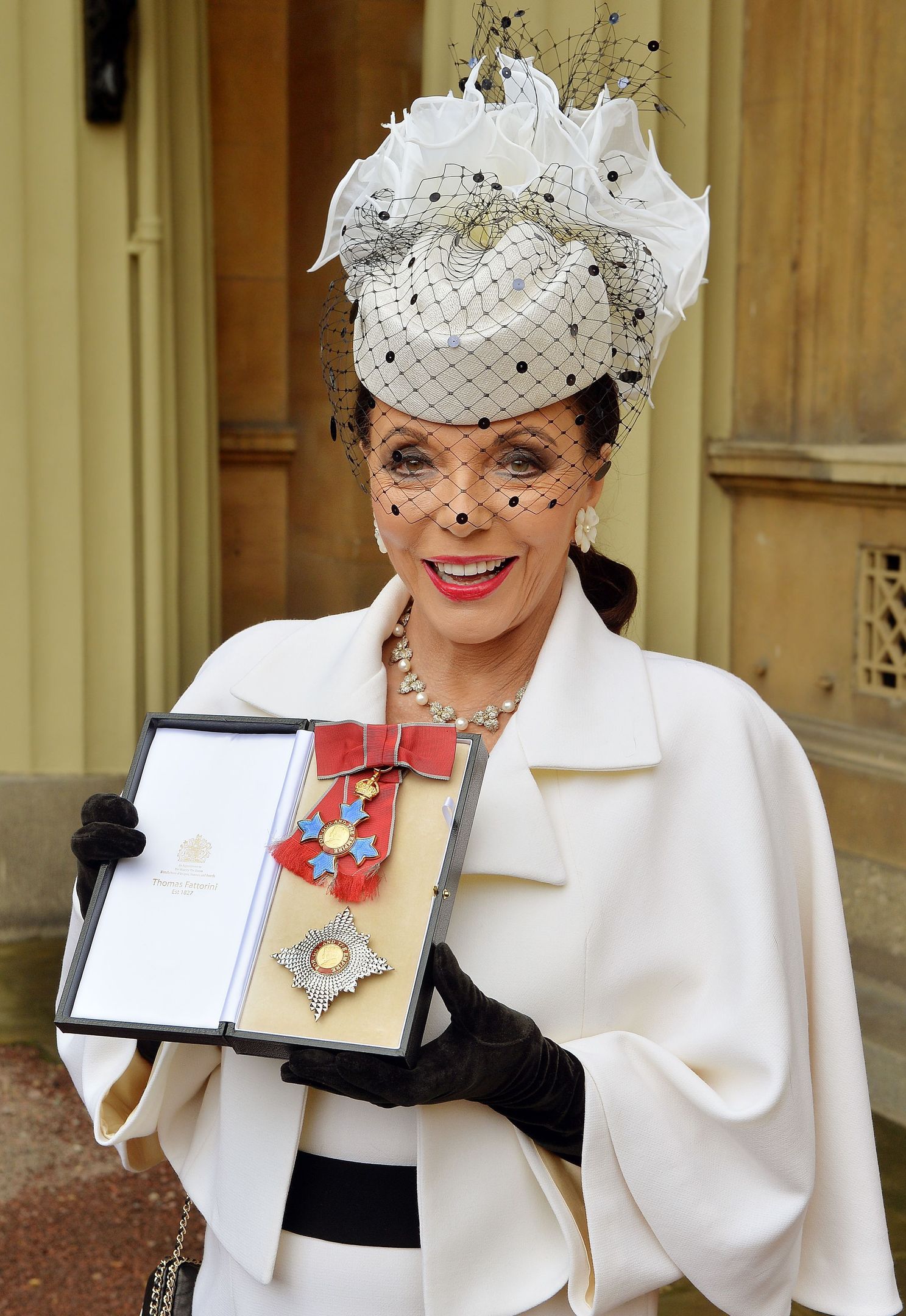 Joan Collins has had a life and career of sparkle in eight decades