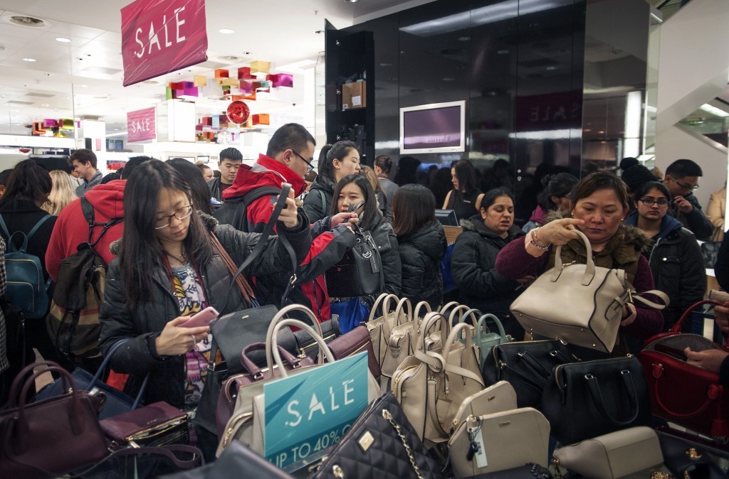 Shoppers in the Harvey Nichols department store at the Boxing Day sales in Edinburgh. (Jane Barlow / PA Wire)