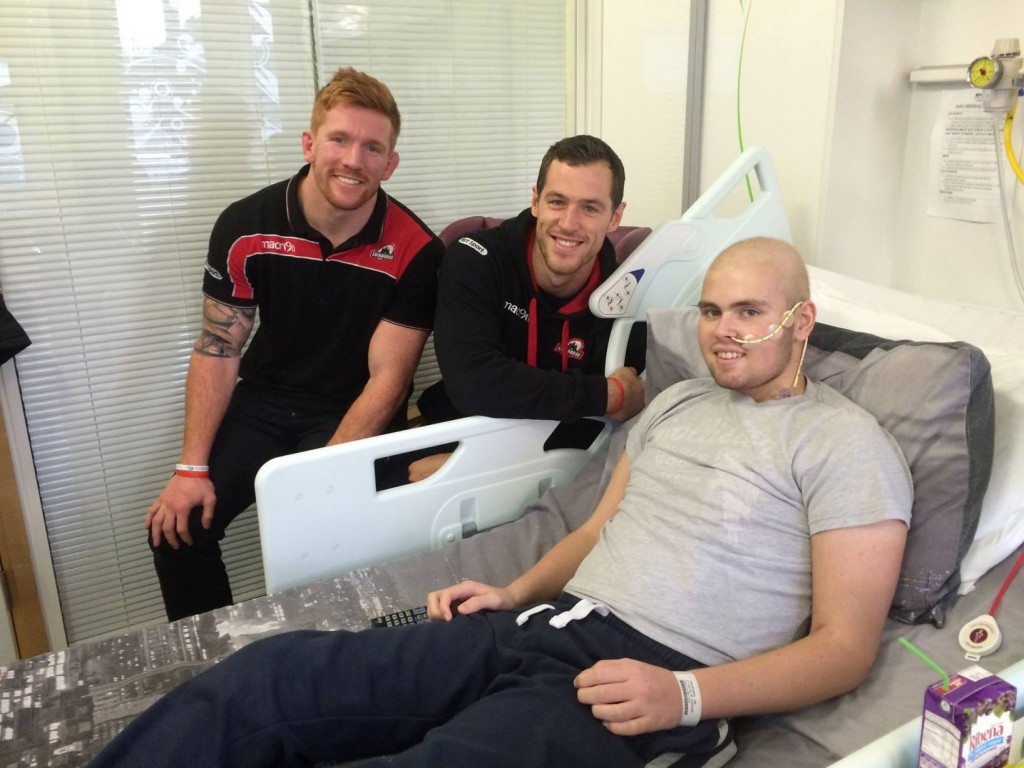 Jak Trueman with Edinburgh rugby players Roddy Grant and Tim Visser