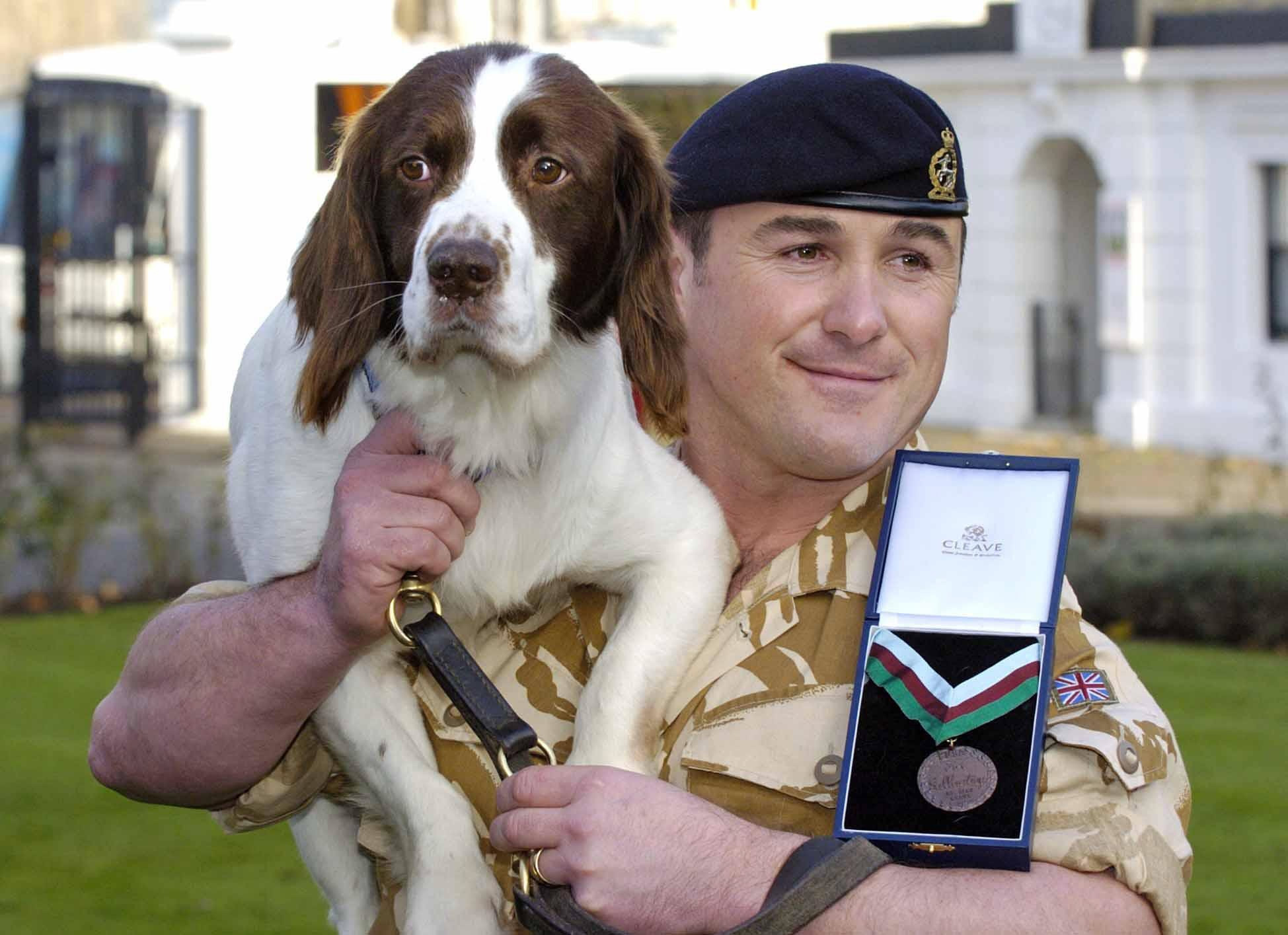 British Army dog Buster with his handler Sgt Danny Morgan (PA Archive)