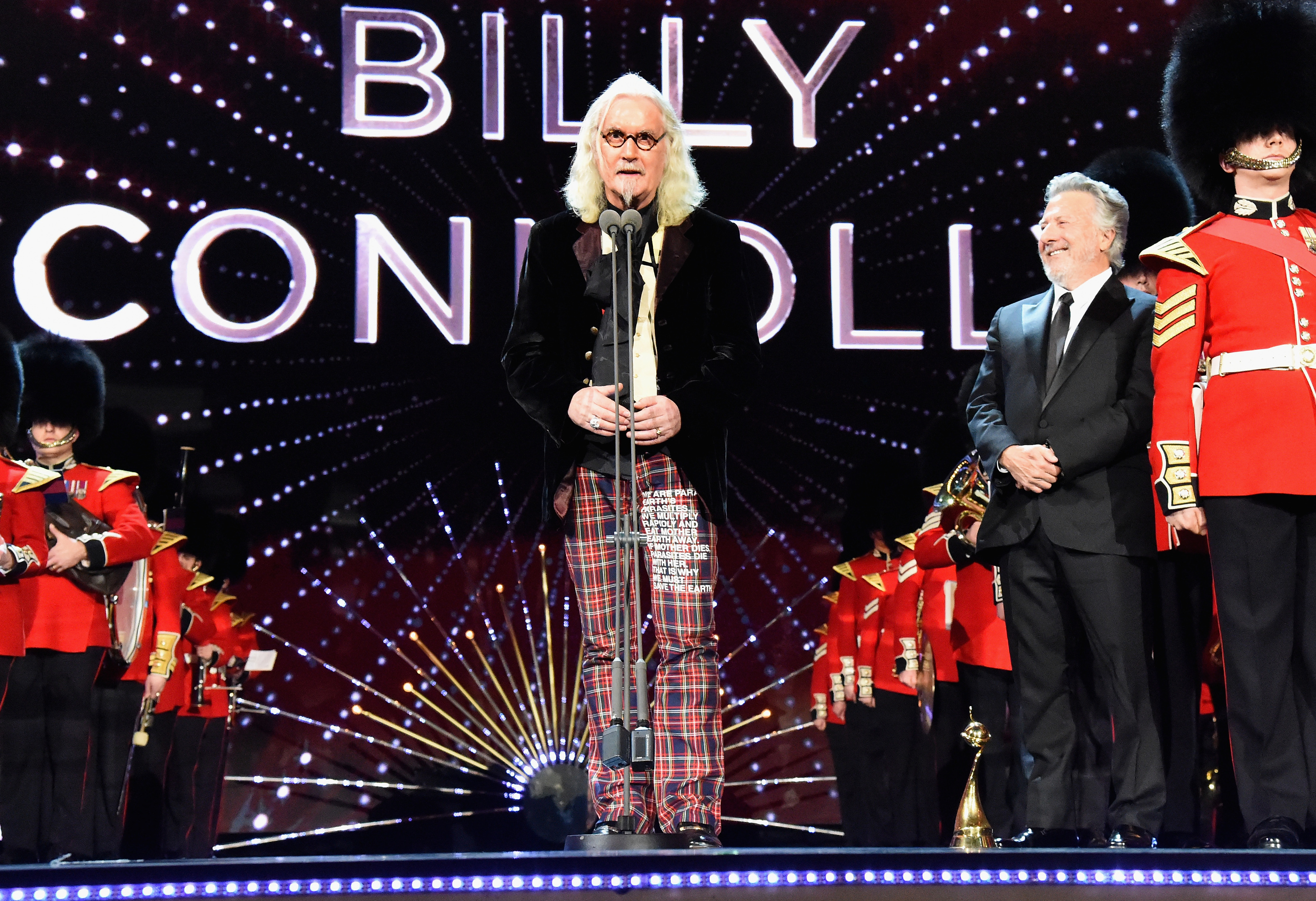 Billy Connolly receives the award for Special Recognition from Dustin Hoffman at the National Television Awards (Alan Chapman/Getty Images)