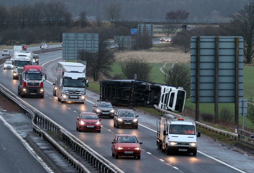 An overturned lorry on the M9 near Falkirk (Andrew Milligan/PA Wire)